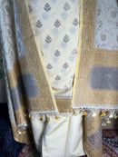 Yellow Banarasi Silk Unstitched Suit with Zari Motif Dupatta