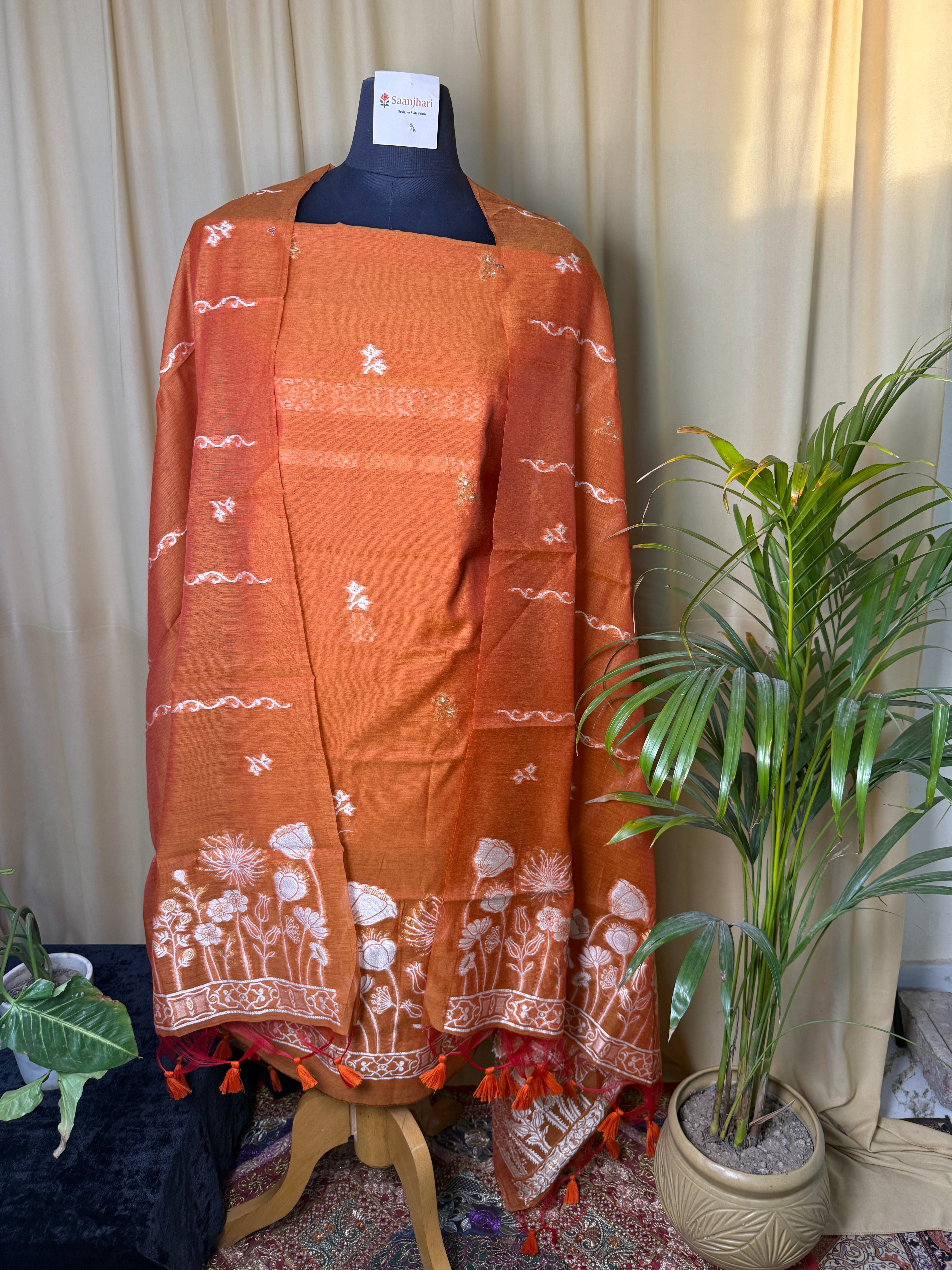 Rust Orange Linen Cotton Suit with Woven Floral Border & Tassel Dupatta
